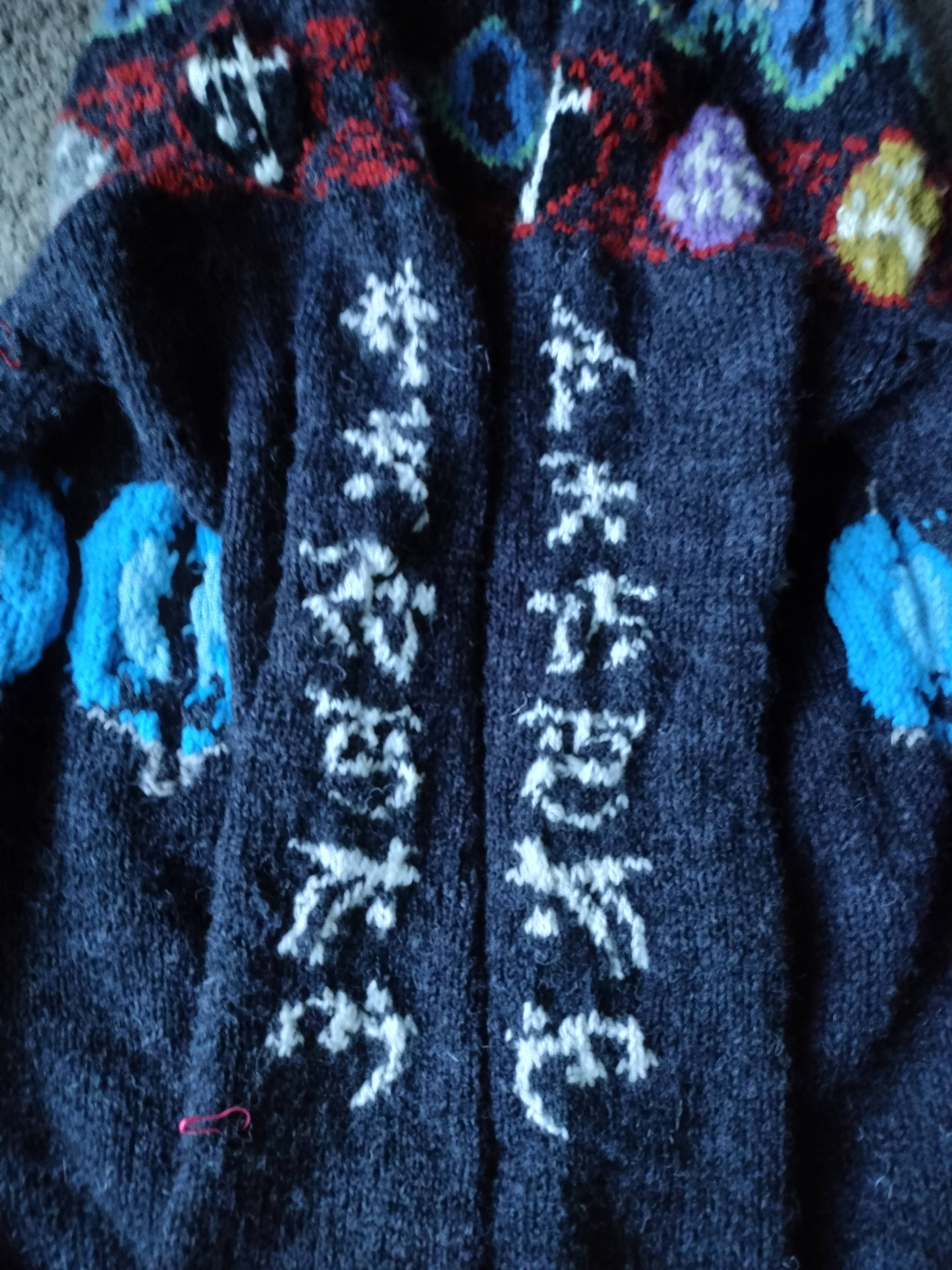 Both sleeves together, lying flat on the floor